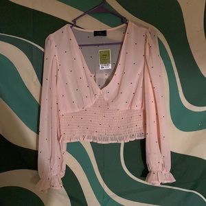 Sheer pink top with black heart